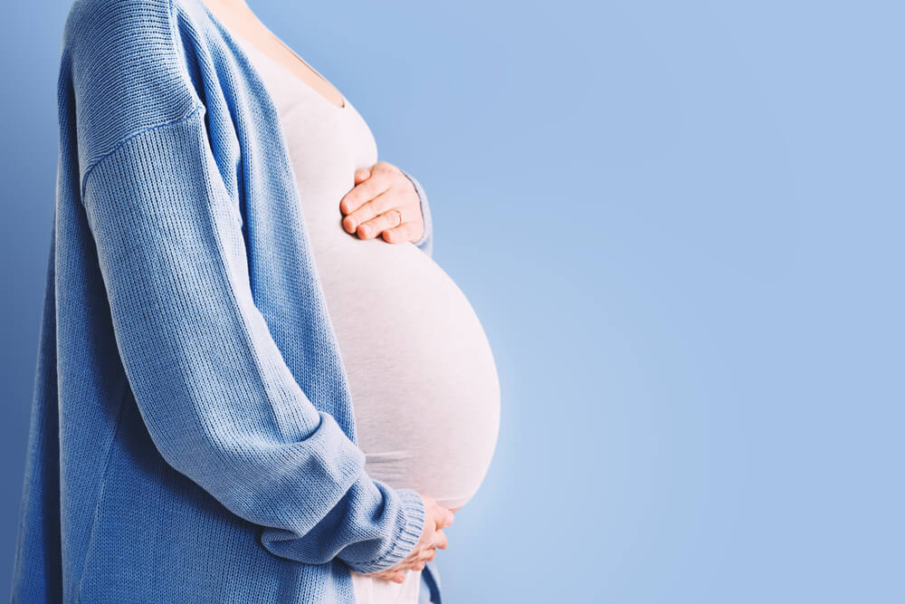 https://www.toplinemd.com/jaime-a-mercado-md/wp-content/uploads/sites/91/2023/11/Beautiful-Pregnant-Woman-Hugging-Her-Belly-In-White-Background.-Expectant-Mother-Waiting-For-Baby-Birth-During-Pregnancy.jpg