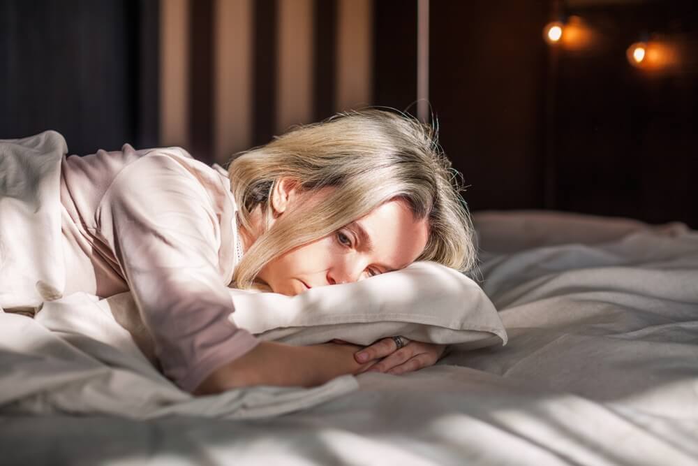 Tired Middle Aged Woman Lying in Bed Can’t Sleep Late at Morning With Insomnia