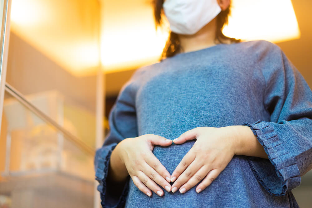 Pregnant Woman With Heart on Her Belly