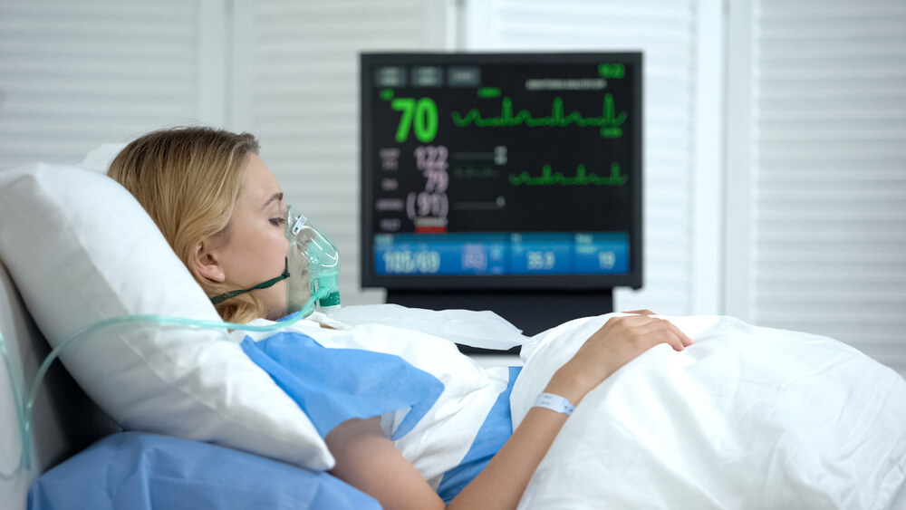 Woman in Reanimation, Stabilized Heart Rate on Ecg Monitor